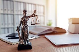 scales of justice on desk