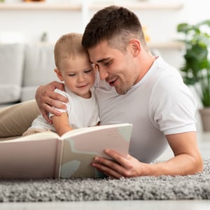 father and child reading
